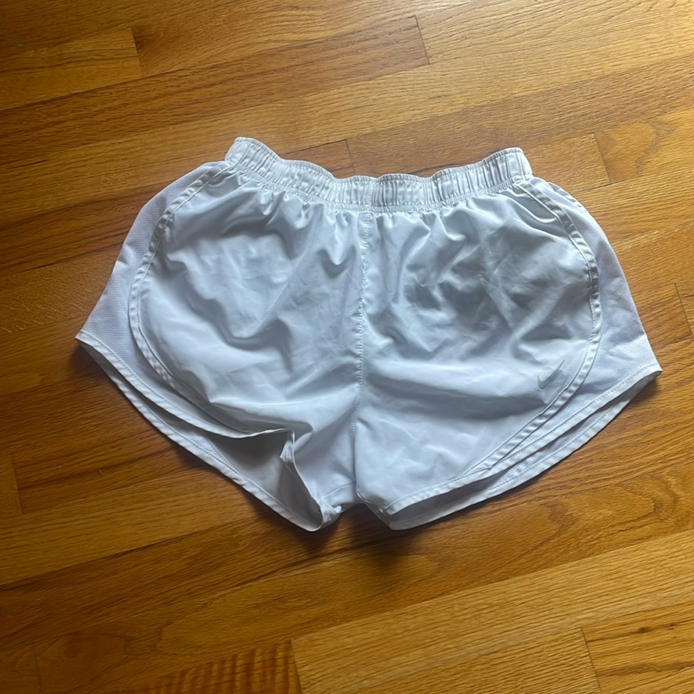 Nike dry fit white shorts and a size medium, barely worn!